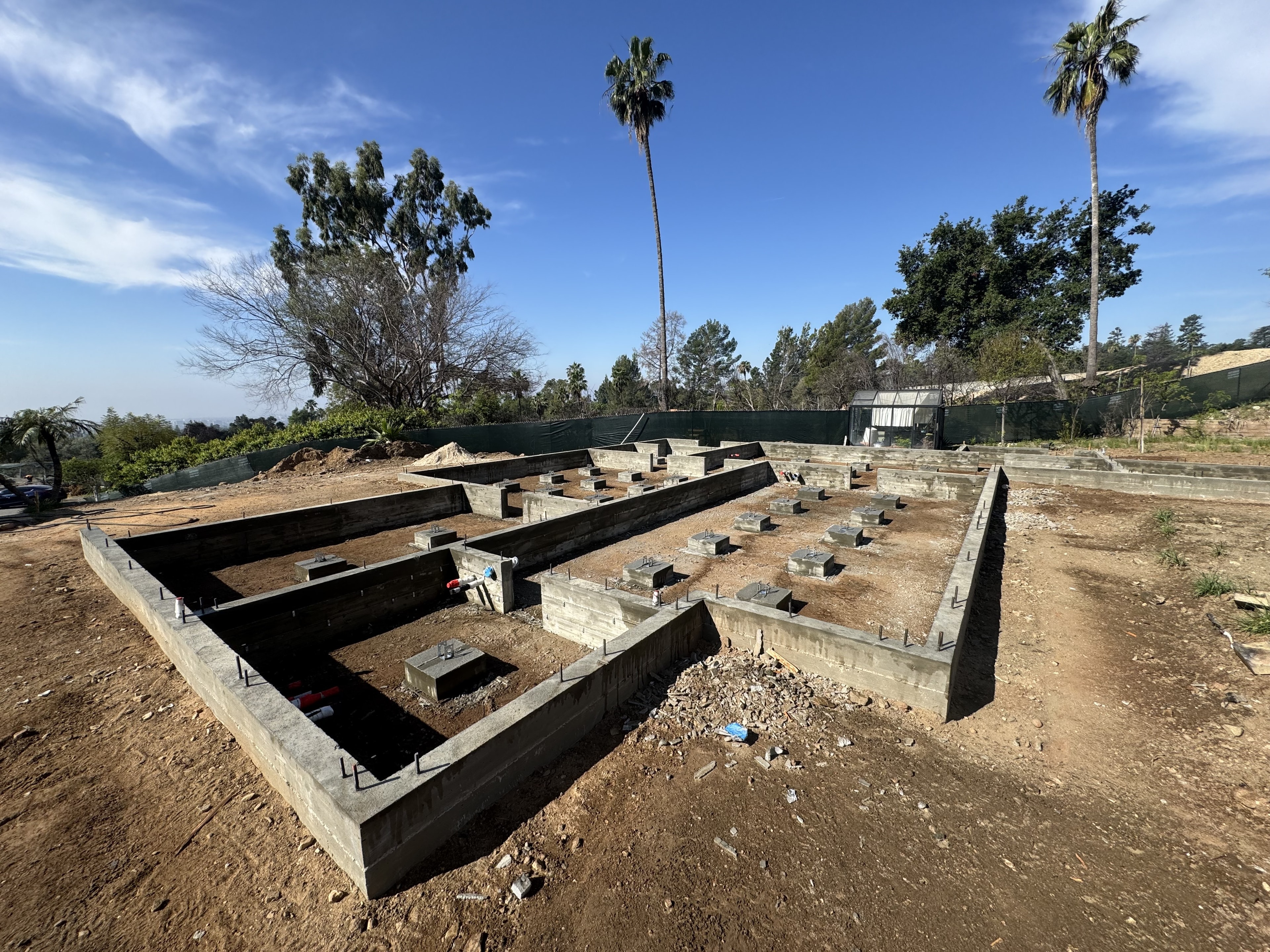Structural concrete perimeter footings on an Altadena fire-rebuild lot, Los Angeles County, CA — Concrete Etc., Inc.