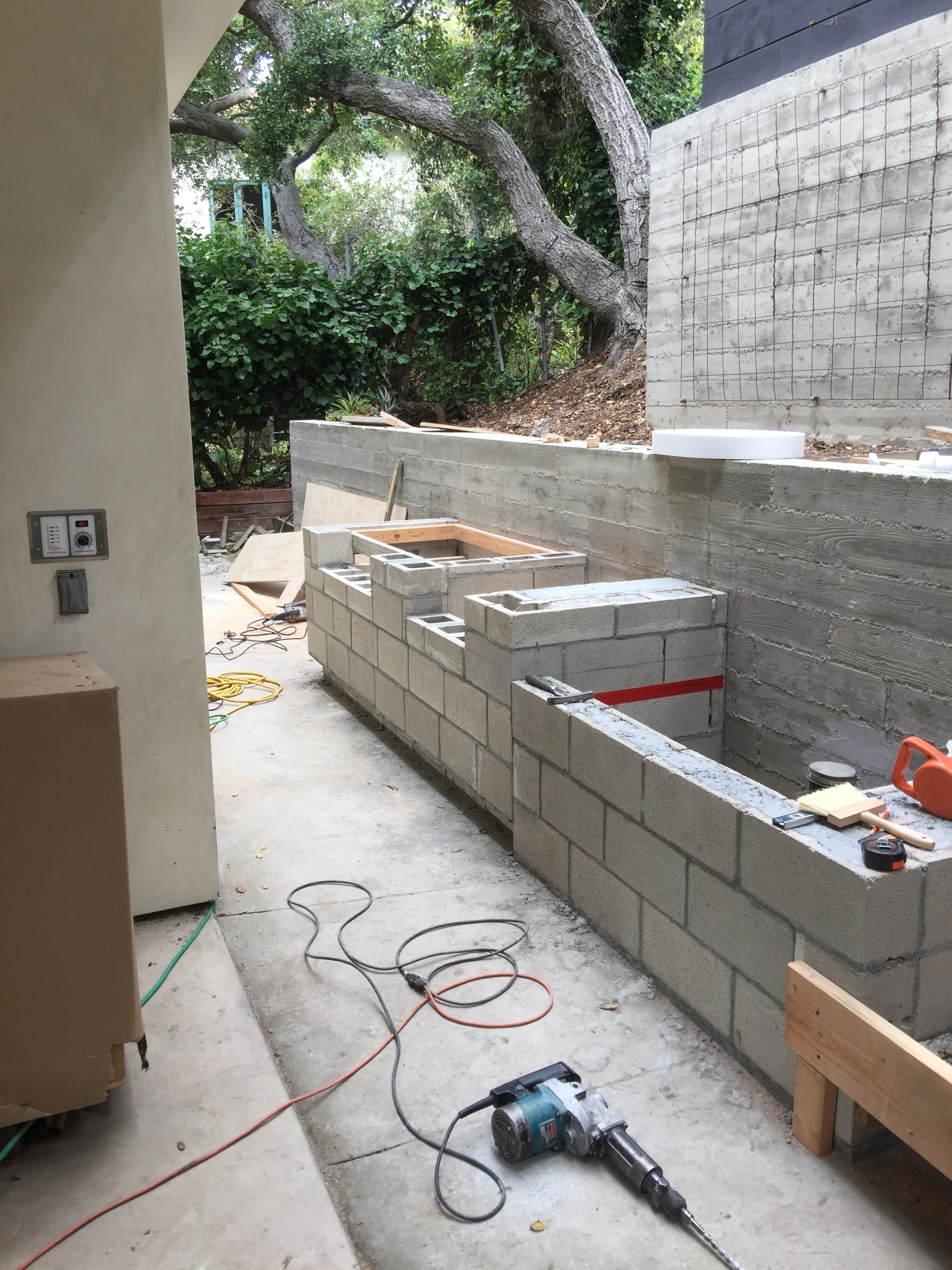 CMU block wall construction on hillside lot in Pacific Palisades by Concrete Etc., Inc., Los Angeles County CA