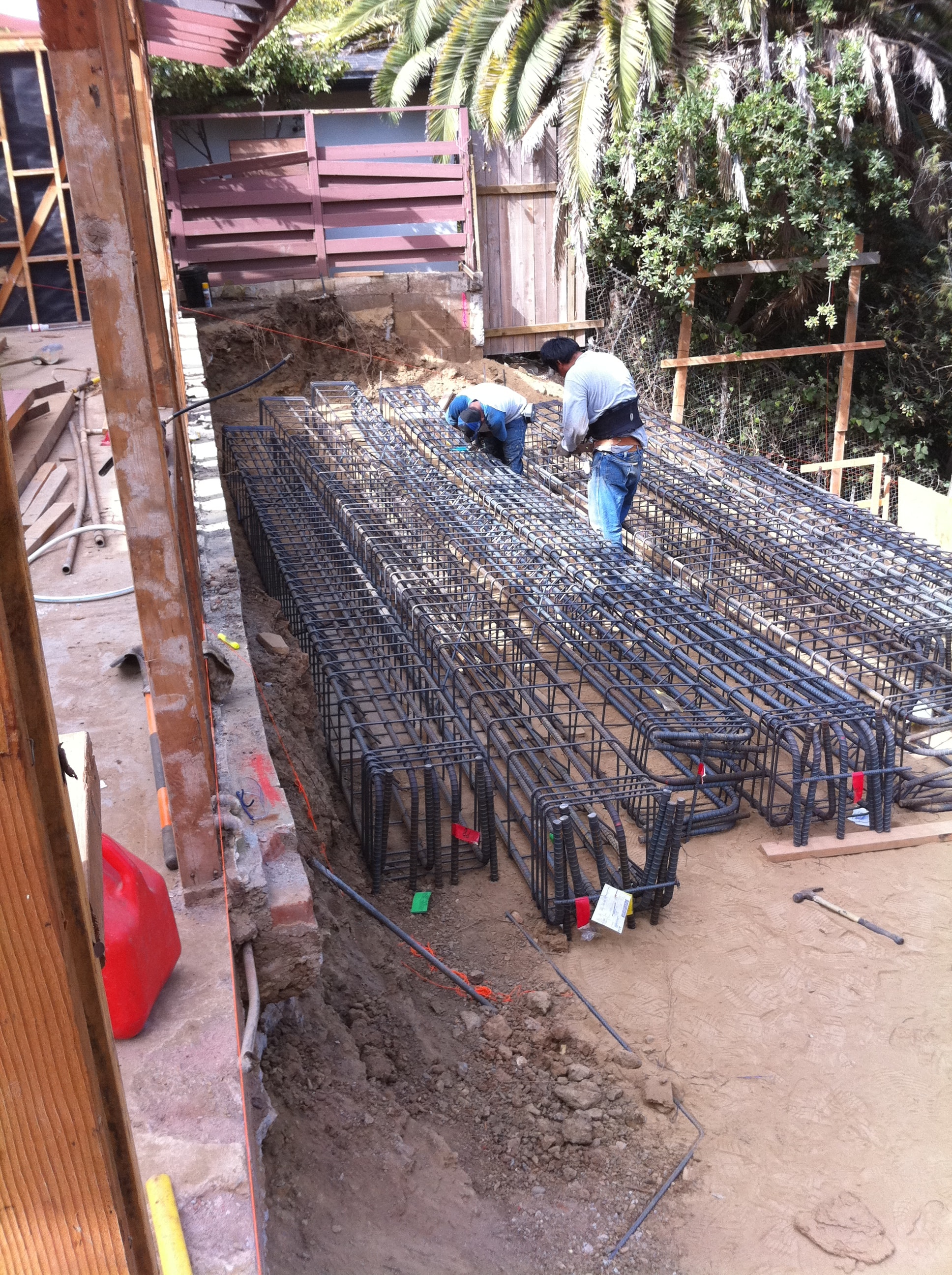 Rebar cage and caisson foundation construction on hillside lot in Pacific Palisades by Concrete Etc., Inc., Los Angeles County CA