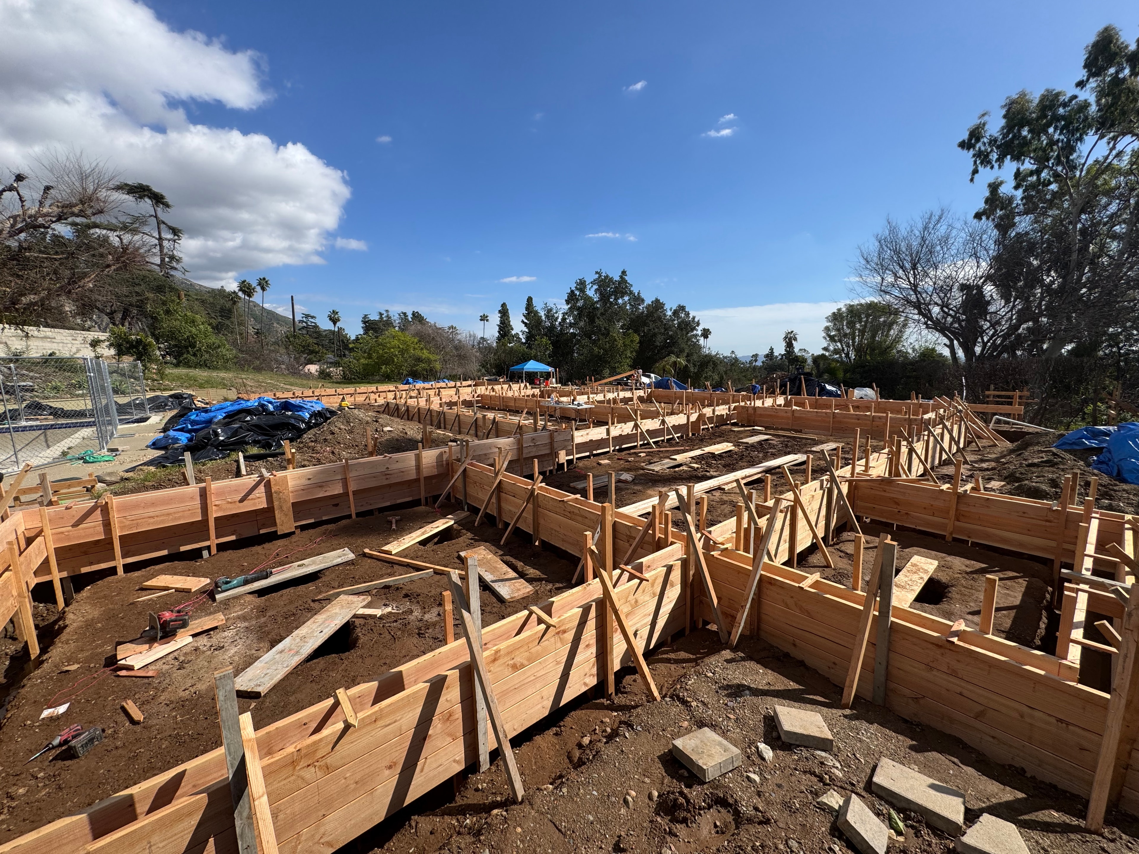 Concrete stemwall foundation wood formwork and rebar reinforcement under construction in Altadena, CA by Concrete Etc., Inc.