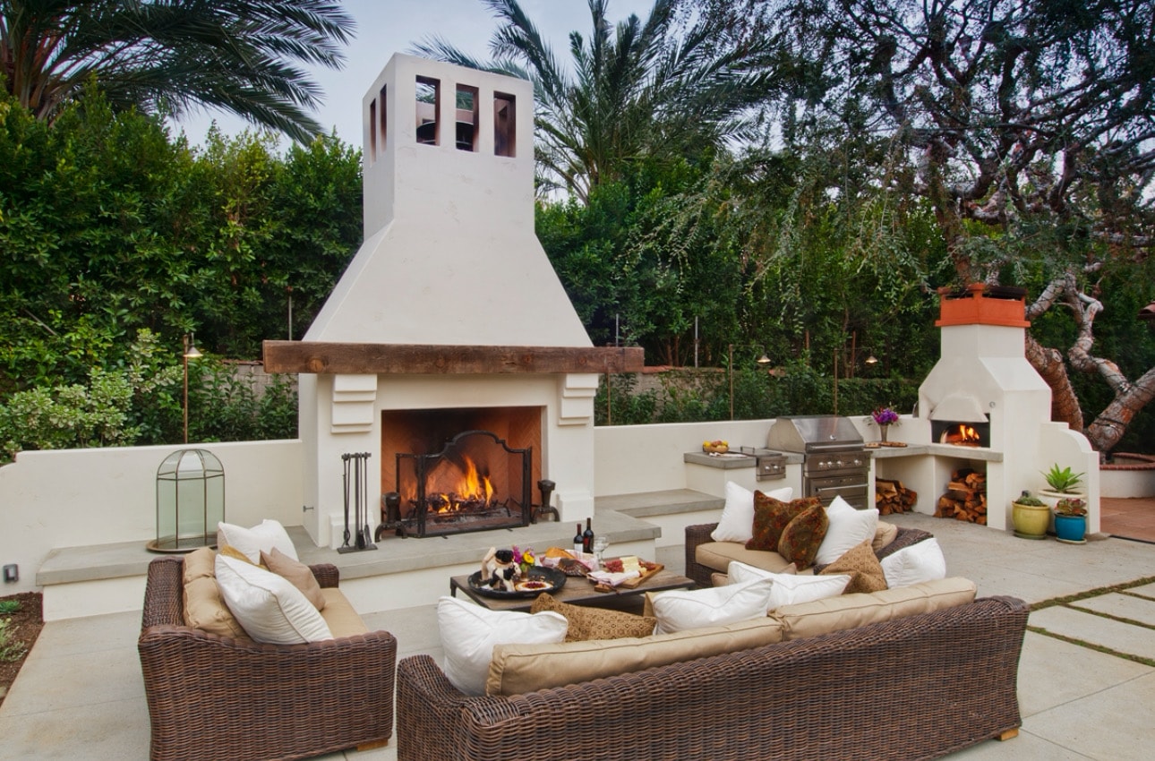 Custom outdoor living area with concrete patio, fireplace, and hardscape installed in Pasadena, CA by Concrete Etc., Inc.