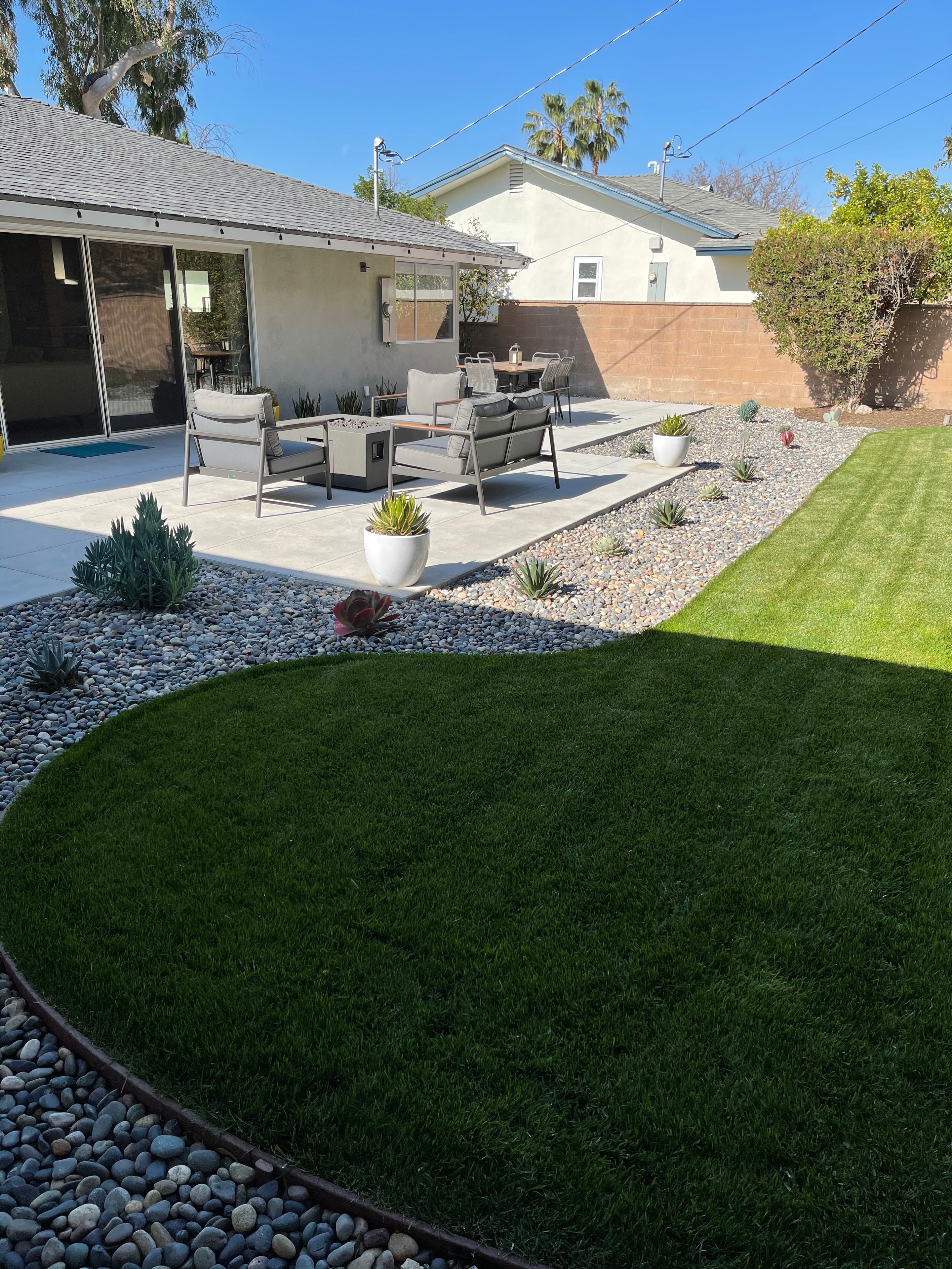Sand finish concrete patio with decorative saw-cut control joints in Pasadena, CA