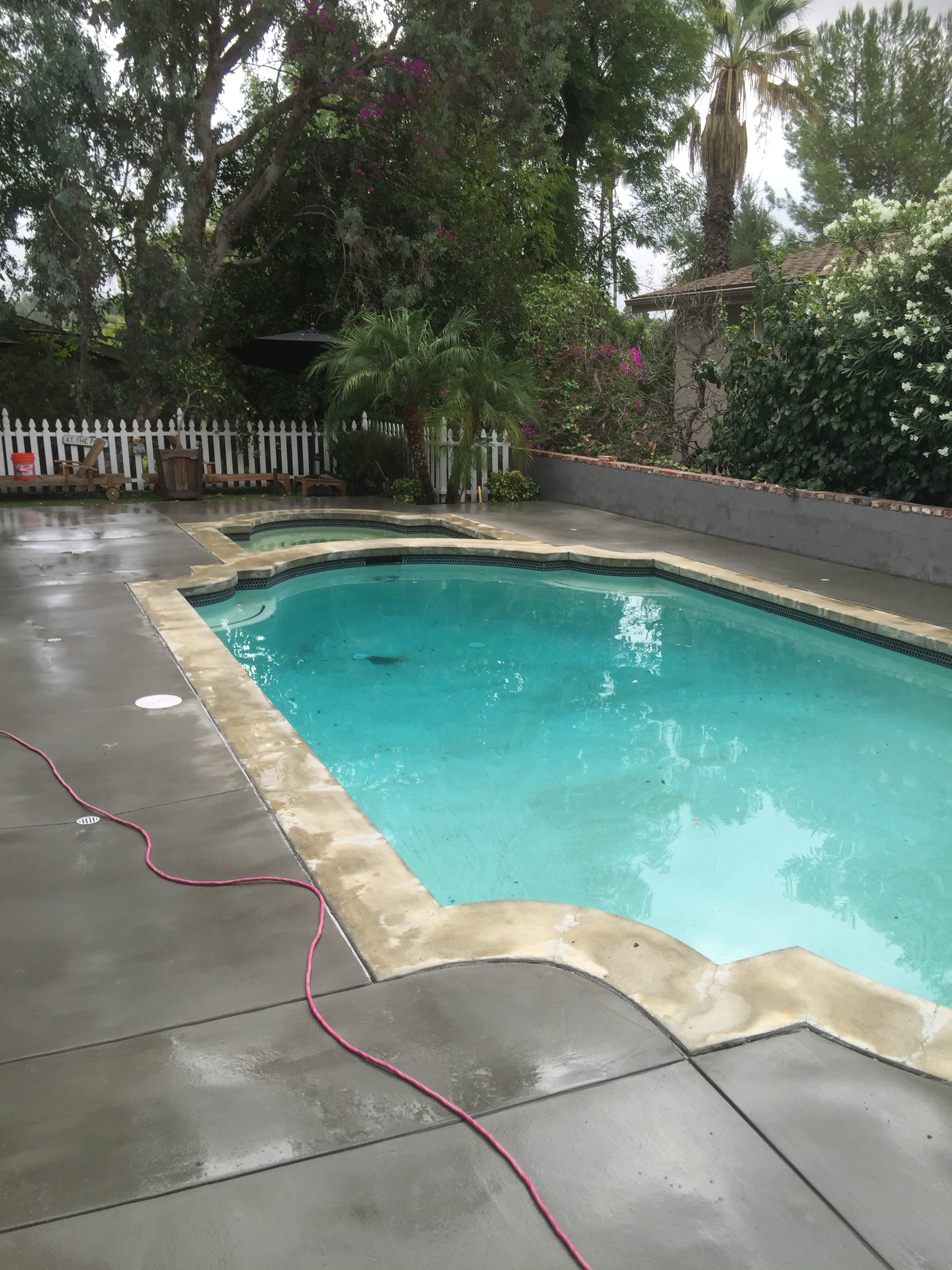 Broom finish concrete pool deck retrofit replacement with new coping installed in Sherman Oaks, CA by Concrete Etc., Inc.