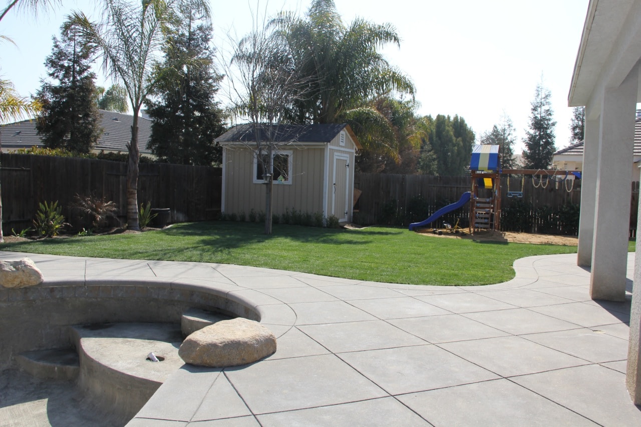 Sand finish concrete patio with curbs and custom concrete work in Los Angeles by Concrete Etc., Inc.