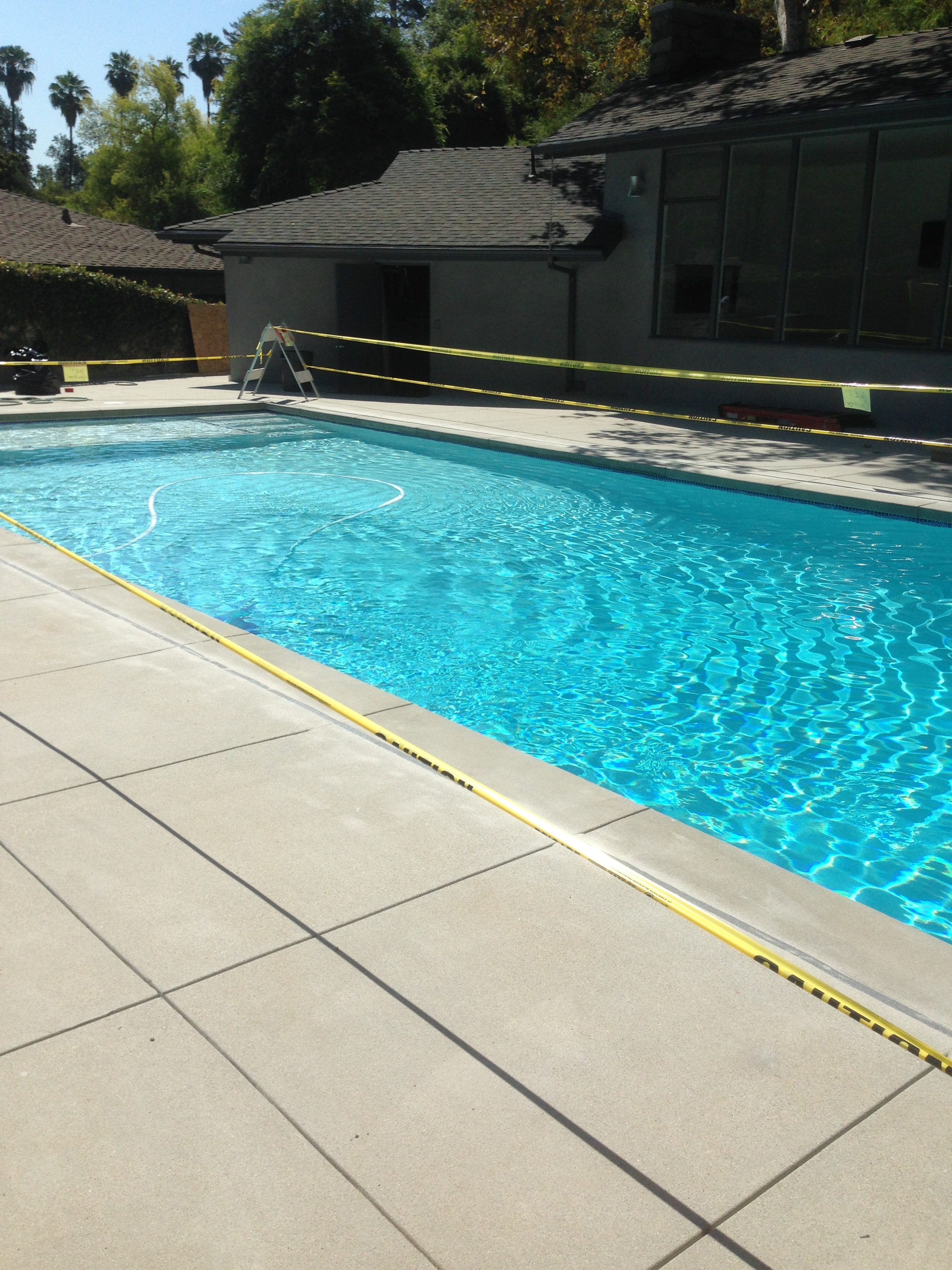 Sand finish concrete pool deck and coping with steps and landing in Pasadena, CA by Concrete Etc., Inc.