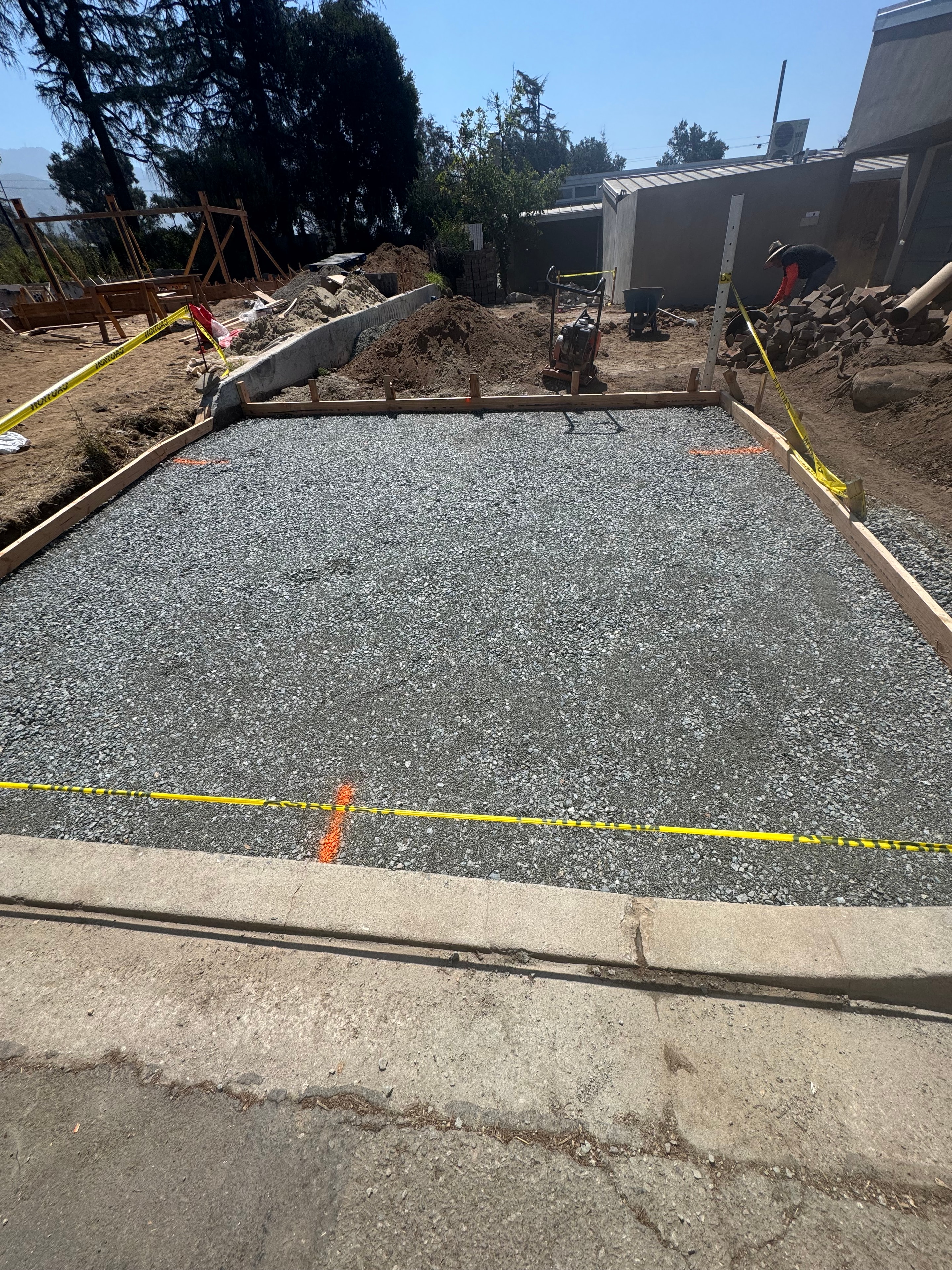 Public works driveway approach subgrade prep with gravel base and formwork in Altadena by Concrete Etc., Inc.