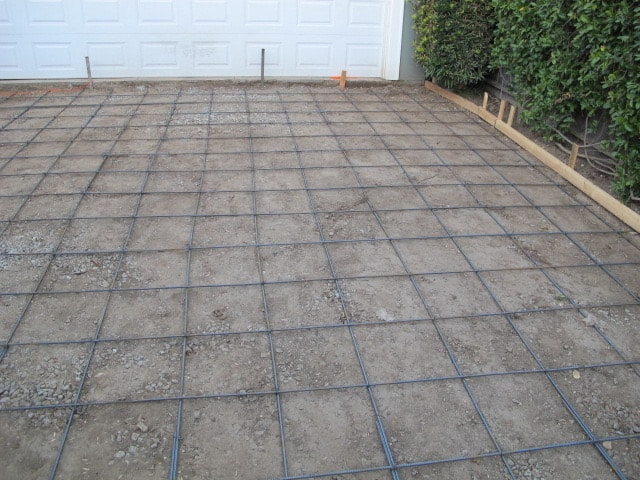 Rebar reinforcement grid laid for concrete driveway installation in Pasadena, CA by Concrete Etc., Inc.