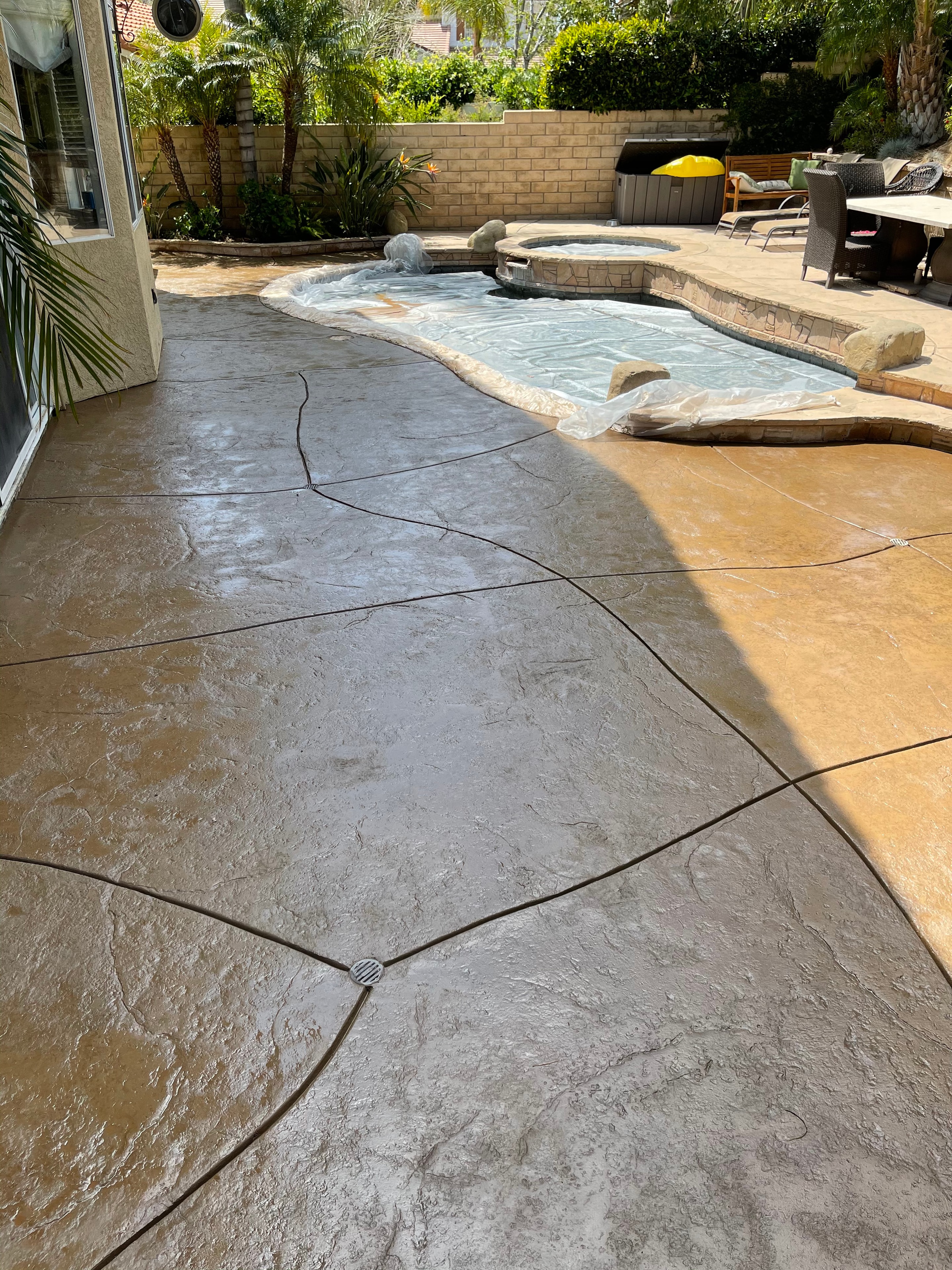 Stamped concrete pool deck with decorative pattern, Santa Clarita