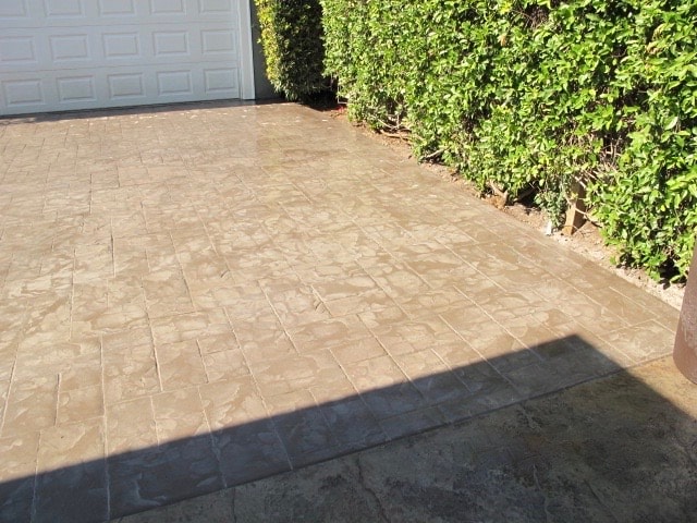 Custom stamped concrete driveway installation in Pasadena, CA by Concrete Etc., Inc.