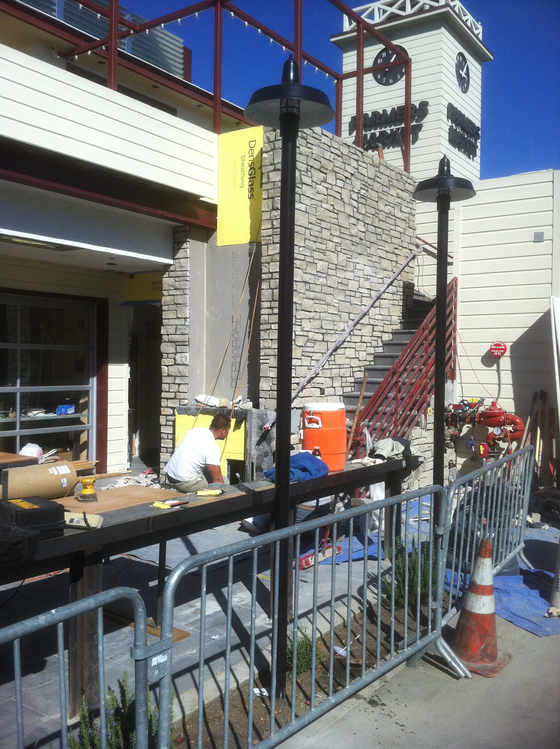 Stone veneer masonry installation in progress by Concrete Etc. in Los Angeles